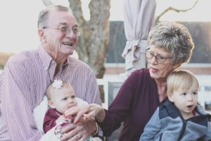 old people with babies